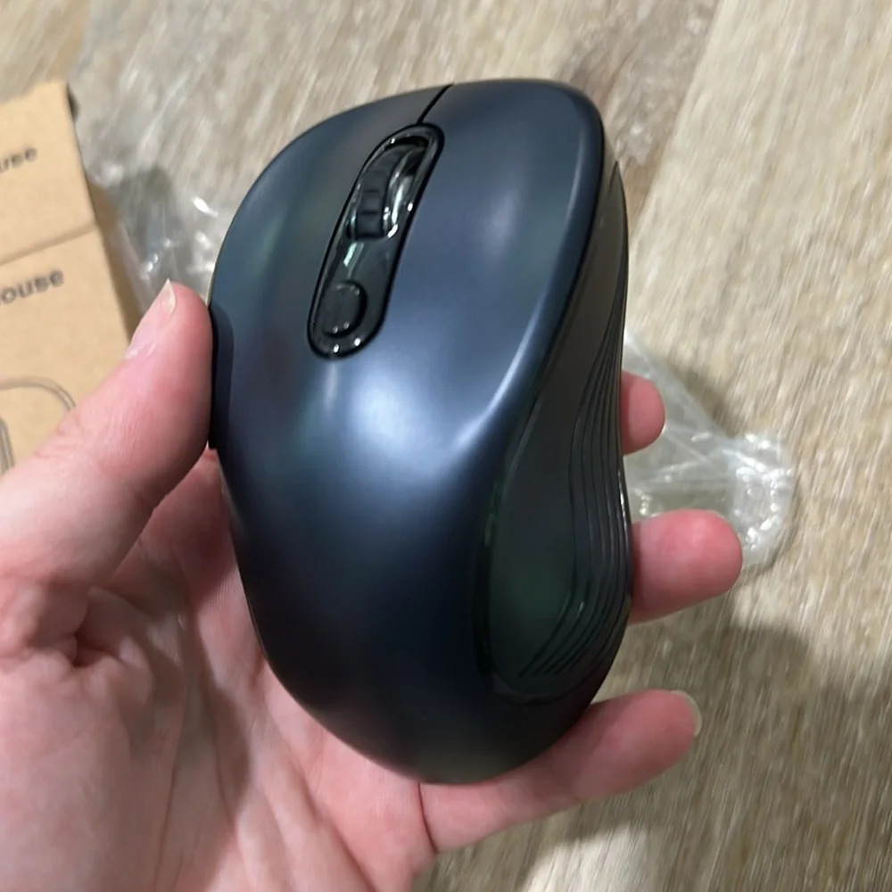 Wireless Black Computer Mouse with blue tint